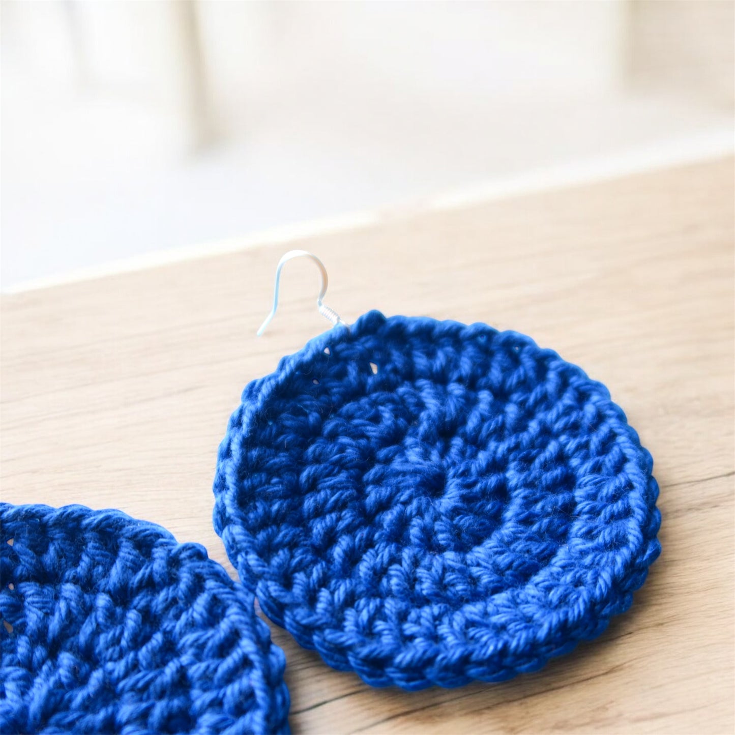 Handmade blue crochet circle earrings